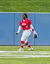 UNM Lobo sophomore Allie Williams dances in the outfield during a game earlier this season.
