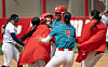 UNM Lobo softball players celebrate Melanie Macias's game-winning hit.
