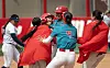 UNM Lobo softball players celebrate Melanie Macias's game-winning hit.