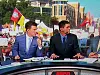 A television screenshot of the familiar site of a UNM Lobos and New Mexico State flag in the background of ESPM's College Game Day broadcast.