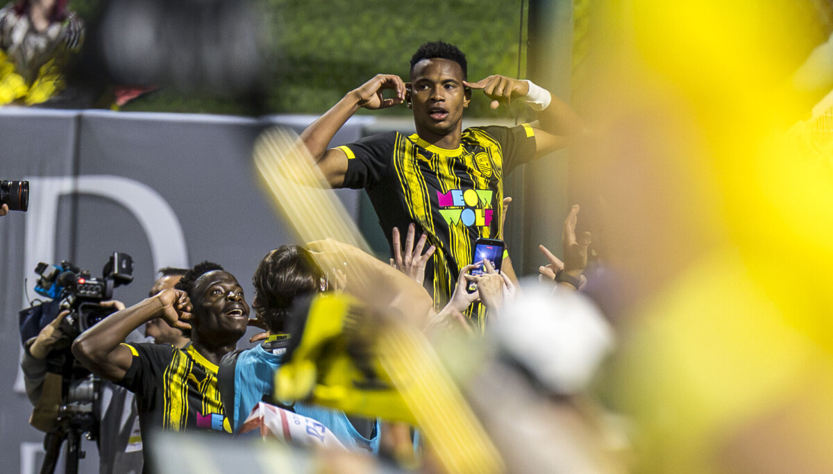 Yes, chef: Howell makes sure his NM United teammates get a taste of his native Jamaica