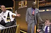Former Denver Broncos quarterback Peyton Manning, left, takes a question from Albuquerque's Austin Denton, right, as CBS Sports analyst Deion Sanders stands between them at Super Bowl 50 in Santa Clara, California, in 2016.