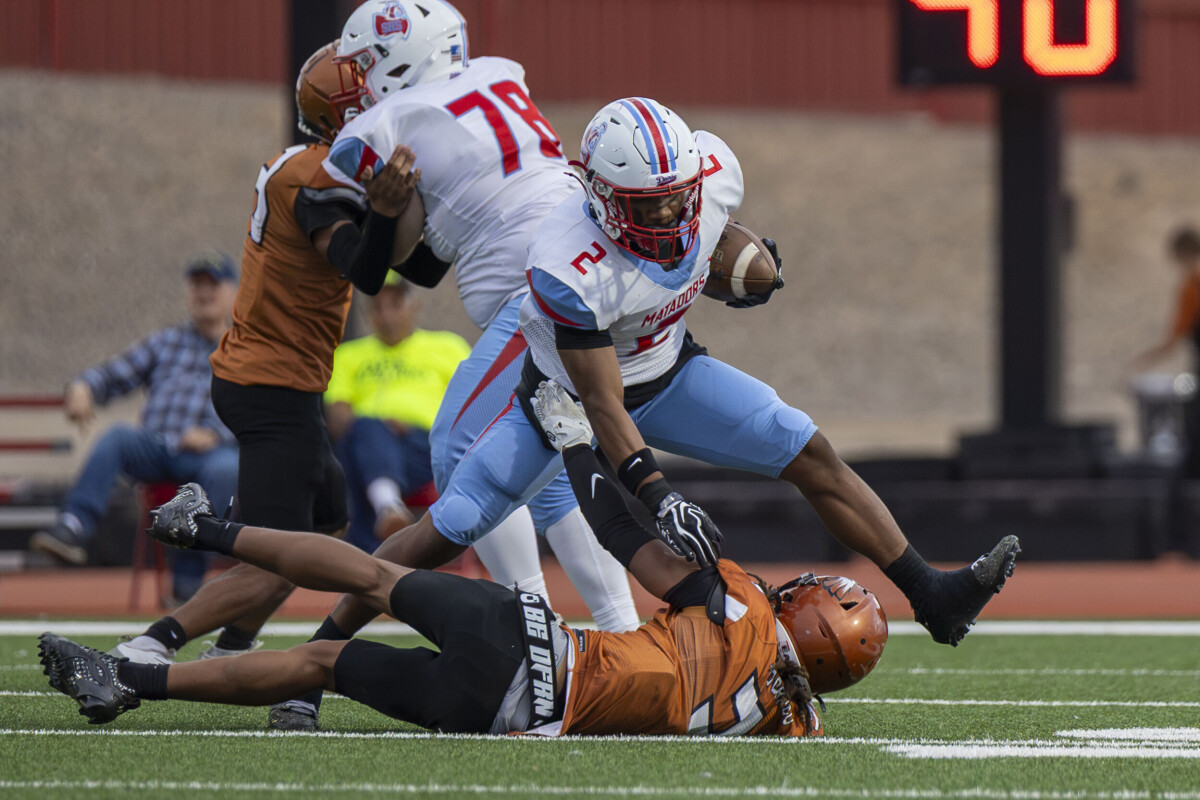 New Mexico high school football teams facing off at the line of scrimmage