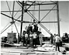 Manhattan Project employees work on the Gadget in southern New Mexico.