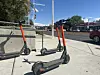 E-scooters left on UNM sidewalk
