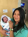 Dr. Valdez with baby