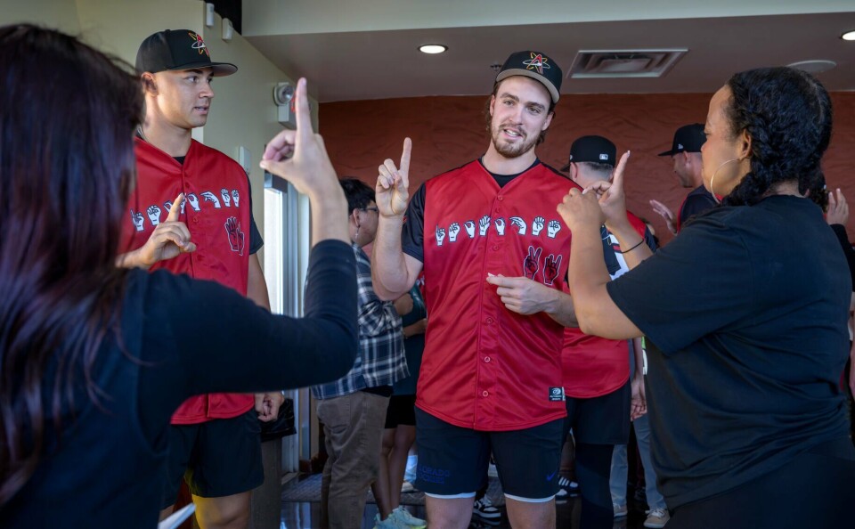 Sign Language Night American Sign Language Night at Isotopes Park features specialty ...