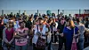 People listen to the pope's mass in Juarez
