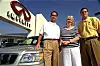 Toby, left, Sheilah and Ed Garcia stand with the 2001 Subaru Forester